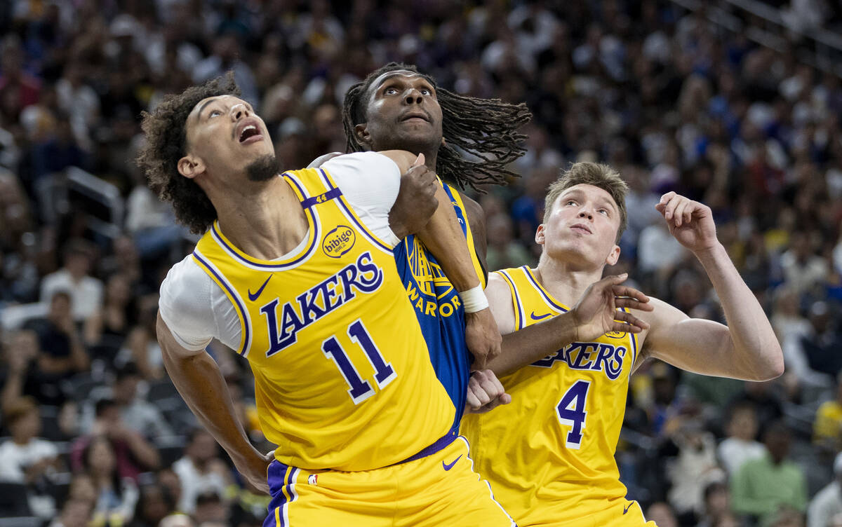 Los Angeles Lakers center Jaxson Hayes (11), Golden State Warriors forward Kevon Looney (5) and ...