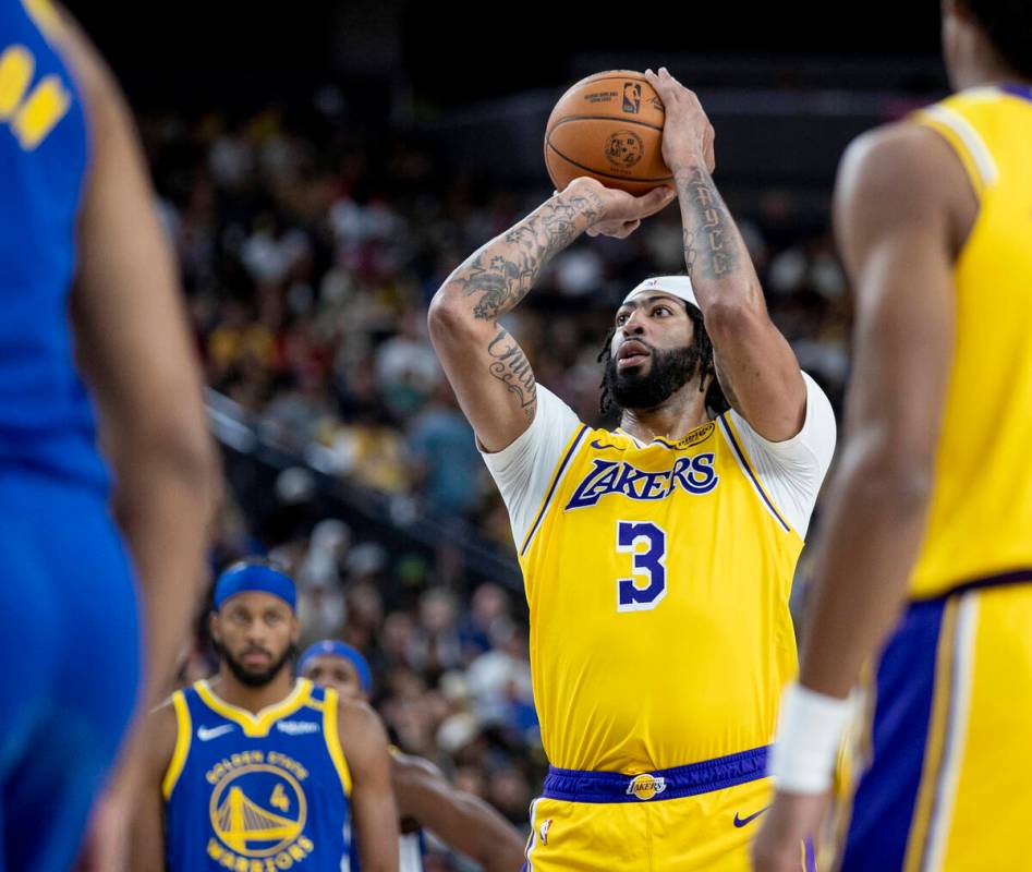 Los Angeles Lakers forward Anthony Davis (3) shoots a free throw during the NBA preseason baske ...