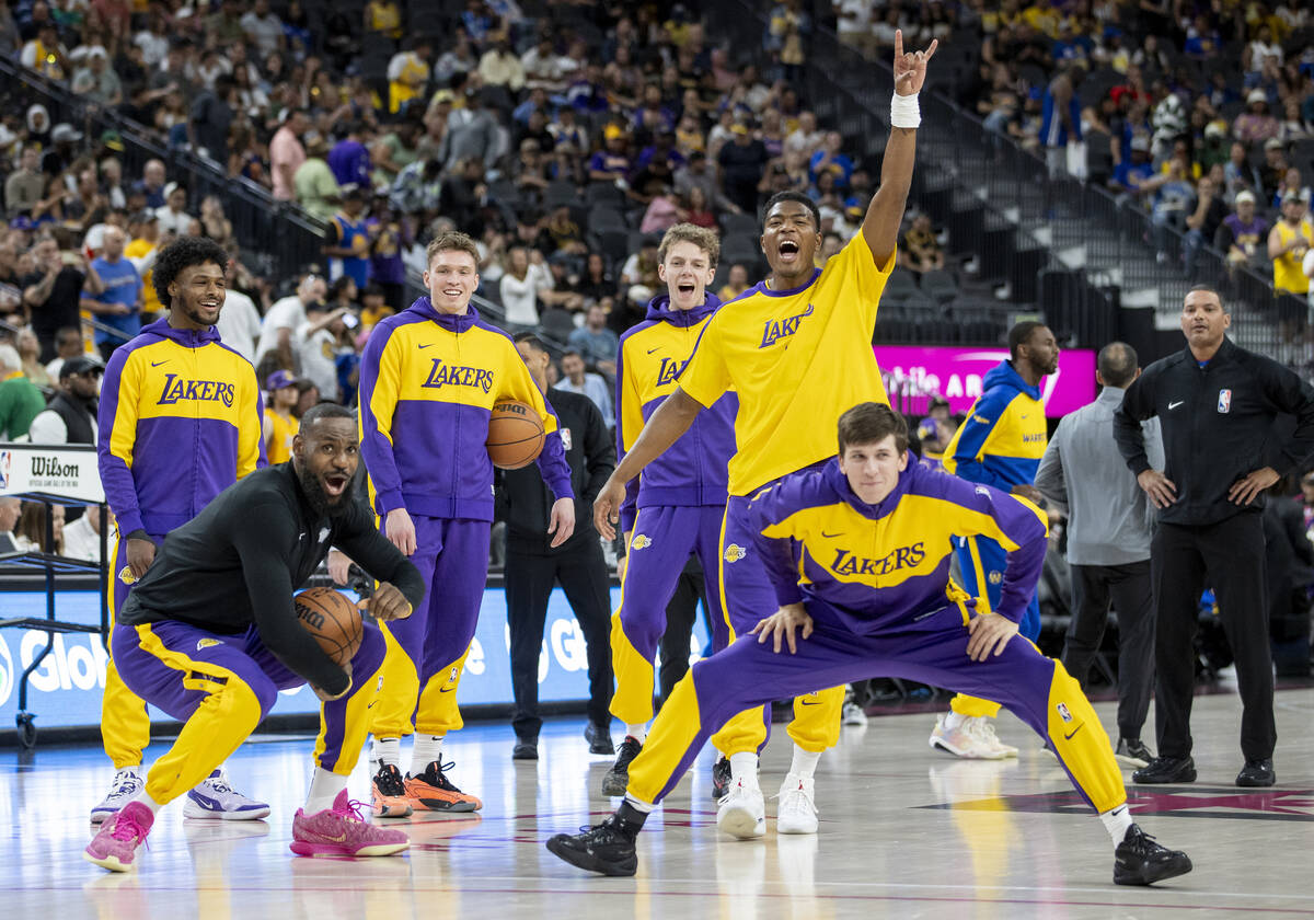 The Los Angeles Lakers react during warmups before the NBA preseason basketball game against th ...