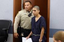 Joshua Robles, who is facing terrorism-related charges, is led into a courtroom for a petition ...