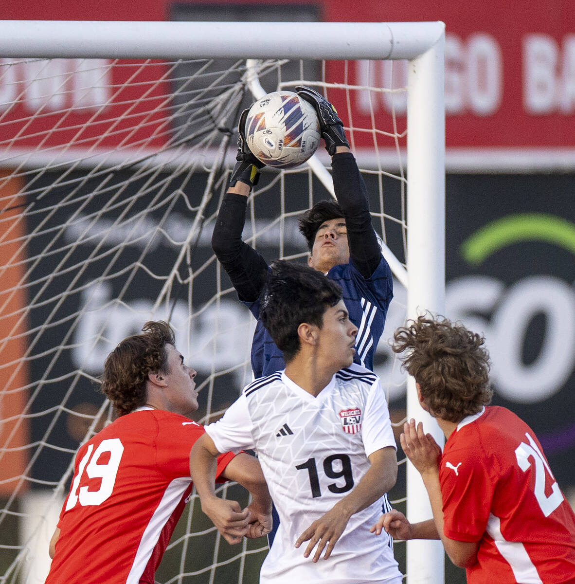 Coronado goalkeeper Logan Pierce (0) catches the ball during the high school soccer game agains ...