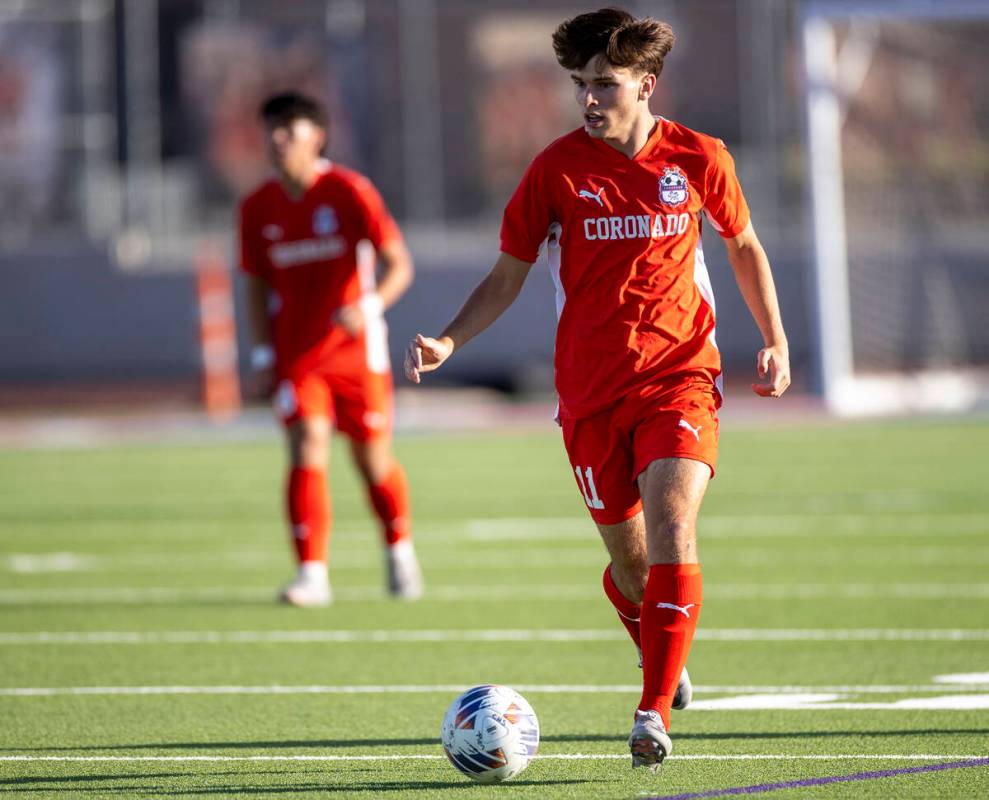 Coronado junior Gavin Flickinger (11) controls the ball during the high school soccer game agai ...