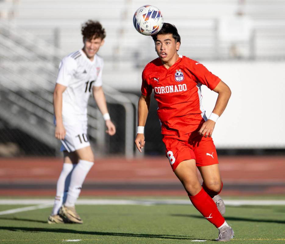 Coronado midfielder Cy Adams (8) looks to control the ball during the high school soccer game a ...