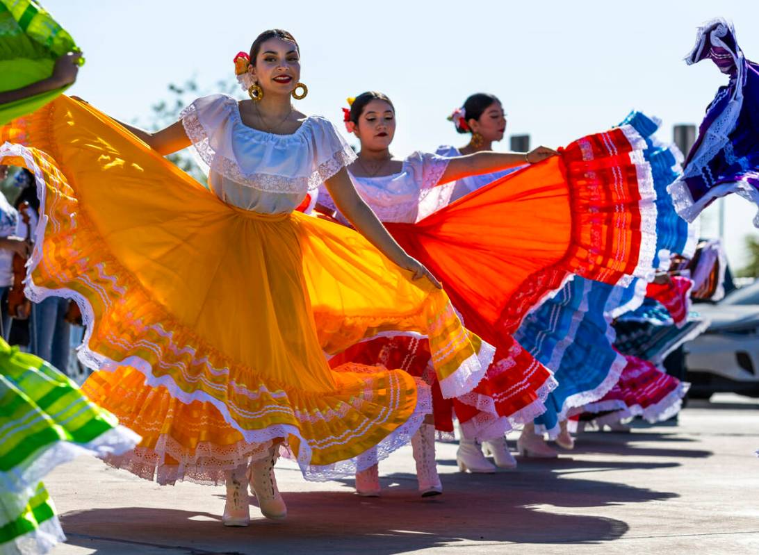 Student Folklorico dancers backed up by a mariachi band perform at the Silver State Education F ...