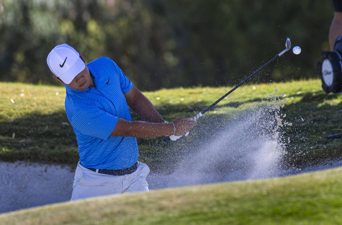 Tom Kim chips out of the sand at hole #7 during the opening round of the Shriners Children's Op ...