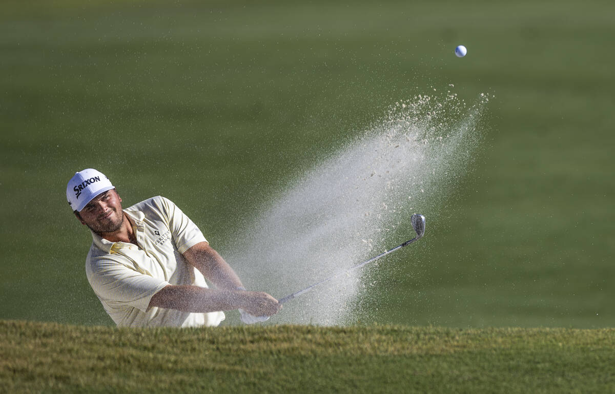 Blaine Hale, Jr. blasts out of a bunker at hole #7 during the opening round of the Shriners Chi ...