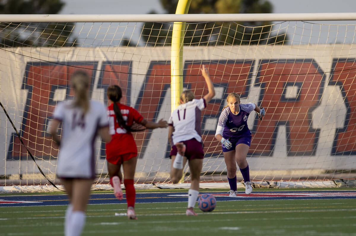 Coronado goalkeeper Emma Duda (00) looks to block a shot during the high school soccer game aga ...