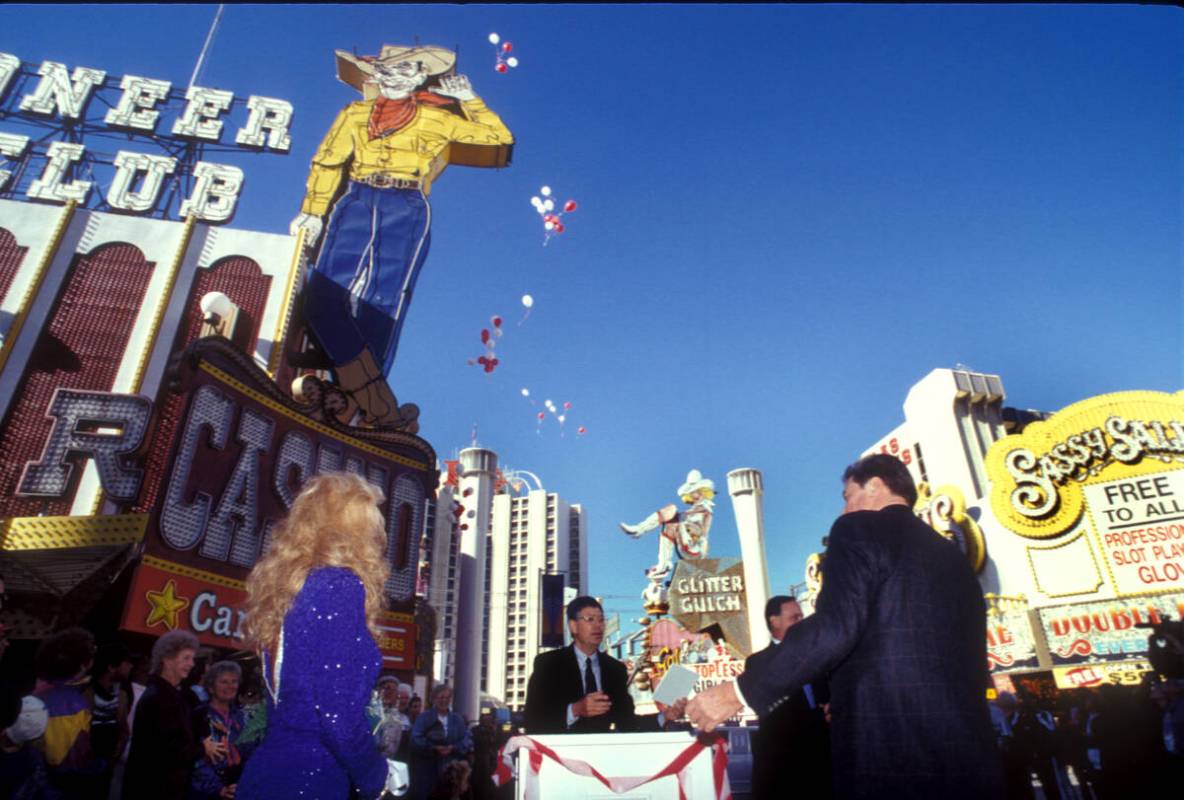 Vegas Vic and Vegas Vickie neon signs are “wed” during a marriage ceremony Decemb ...