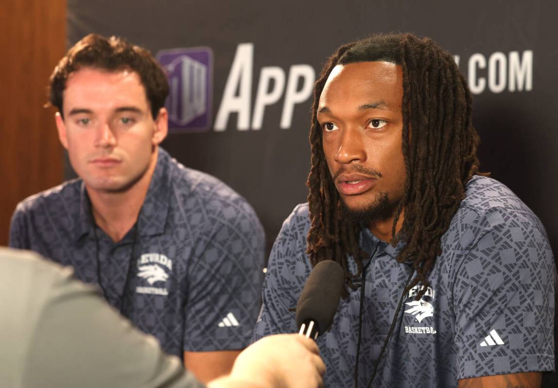 Nevada Wolf Pack forward Tre Coleman speaks as forward Nick Davidson, left, looks on during the ...