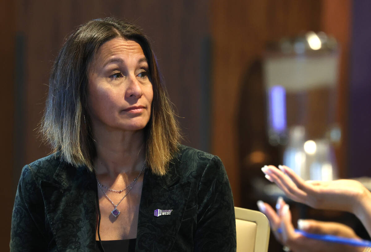 Mountain West Conference commissioner Gloria Nevarez listens to reporters questions during men' ...