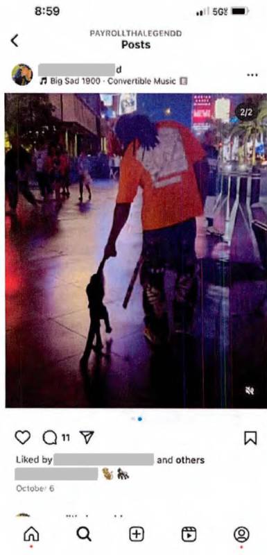 A post on Jezmyn Hays' social media account shows Hays walking with his monkey down Las Vegas B ...