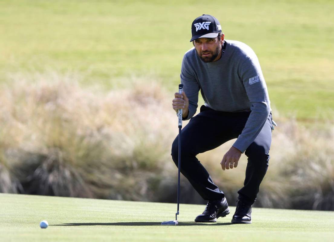 Rafael Campos checks the line at hole 18th during the second round of the Shriners Children's O ...