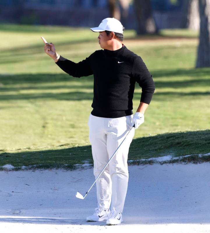 Tom Kim signals from the 9th fairway during the second round of the Shriners Children's Open at ...