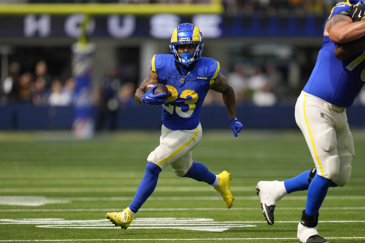 Los Angeles Rams running back Kyren Williams runs during the first half of an NFL football game ...