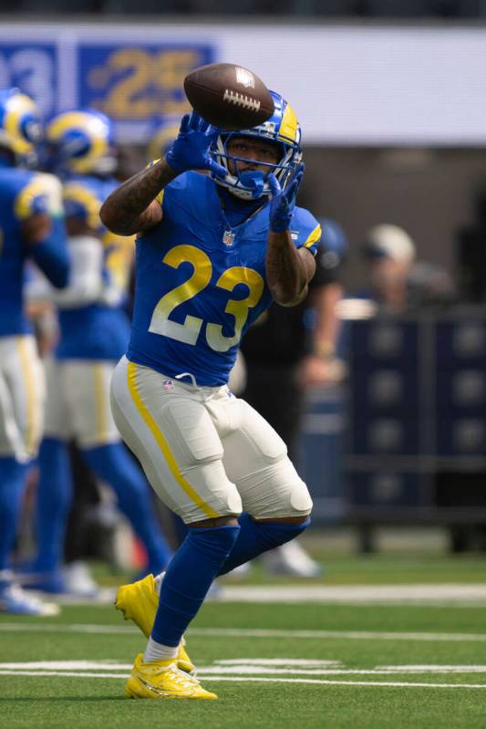 Los Angeles Rams running back Kyren Williams (23) catches the ball before an NFL football game ...