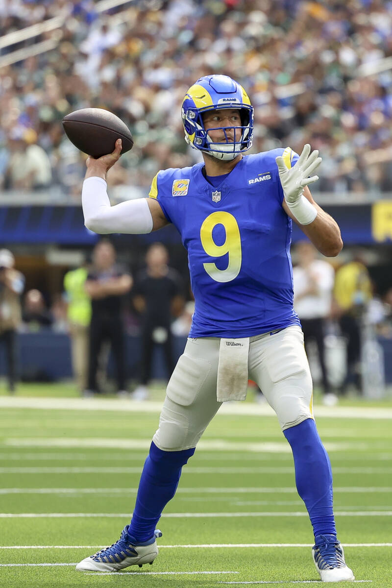 Los Angeles Rams quarterback Matthew Stafford throws during an NFL football game against the Gr ...