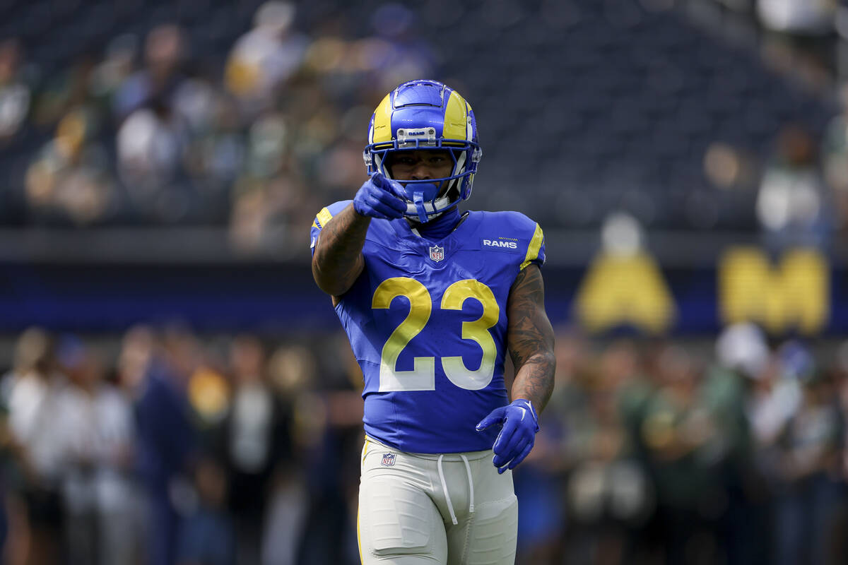 Los Angeles Rams running back Kyren Williams warms up before an NFL football game against the G ...