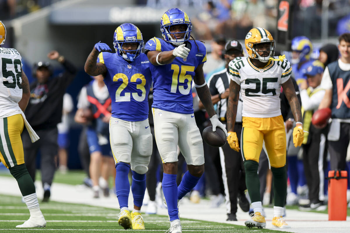 Los Angeles Rams wide receiver Demarcus Robinson (15) and Los Angeles Rams running back Kyren W ...