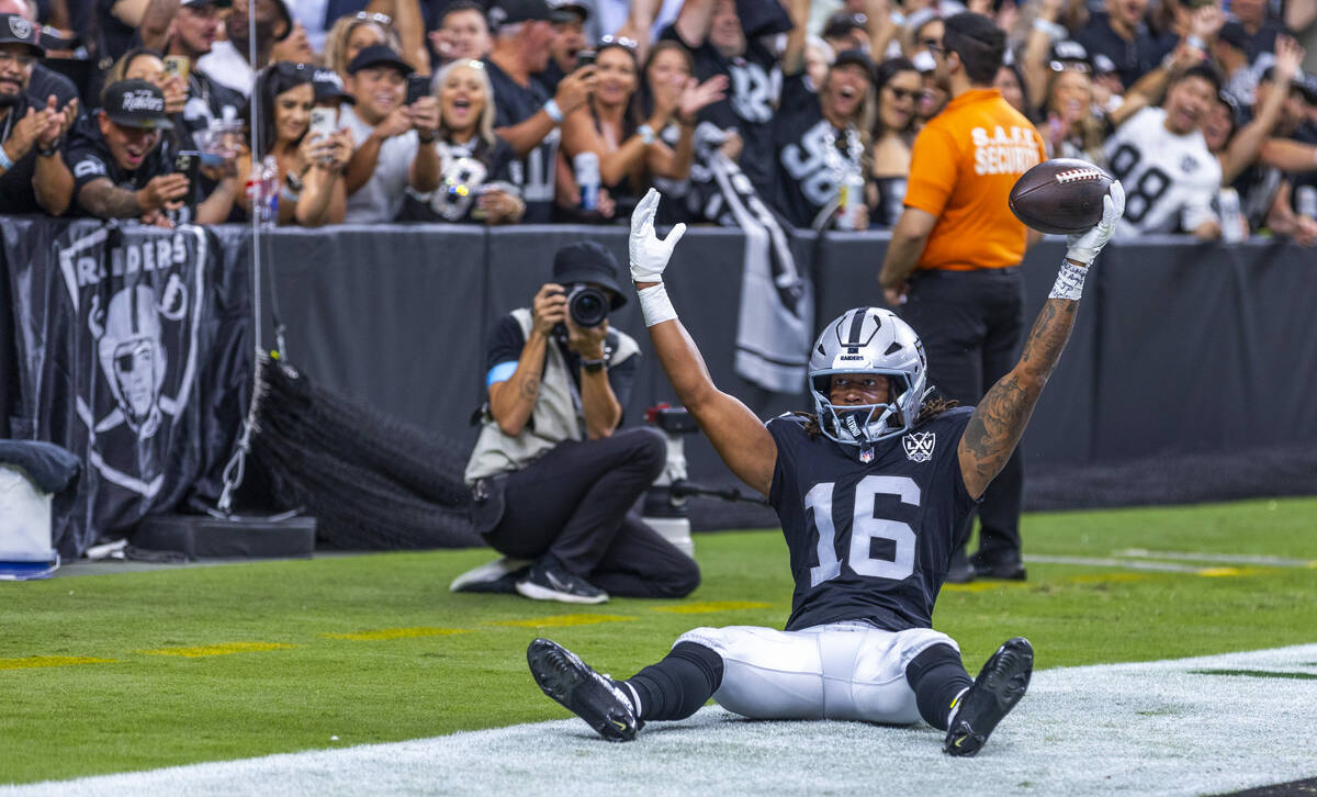 Raiders wide receiver Jakobi Meyers (16) celebrates a pass reception in the end zone as Carolin ...