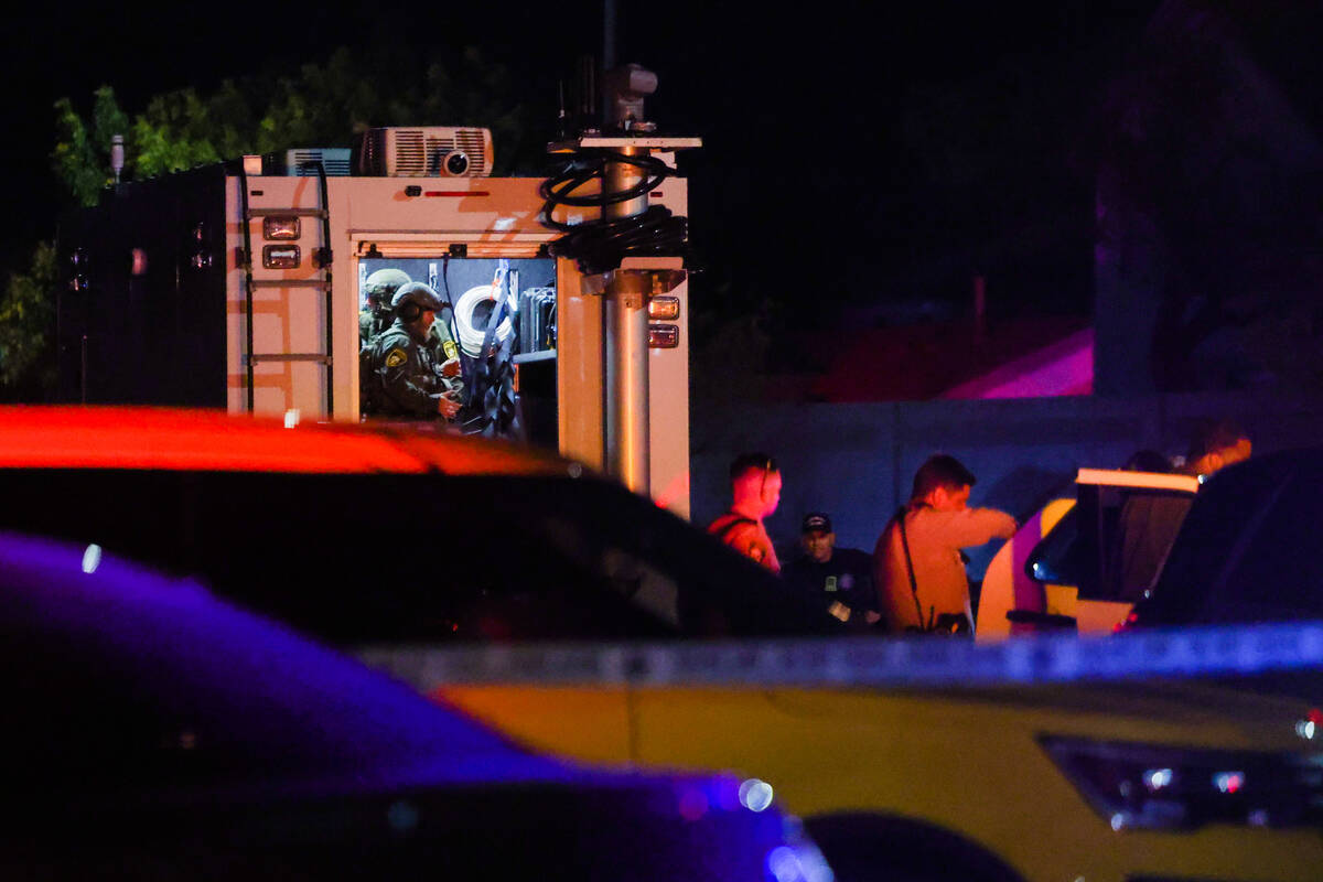 Metropolitan Police Department officers are seen on scene at an officer-involved shooting on So ...