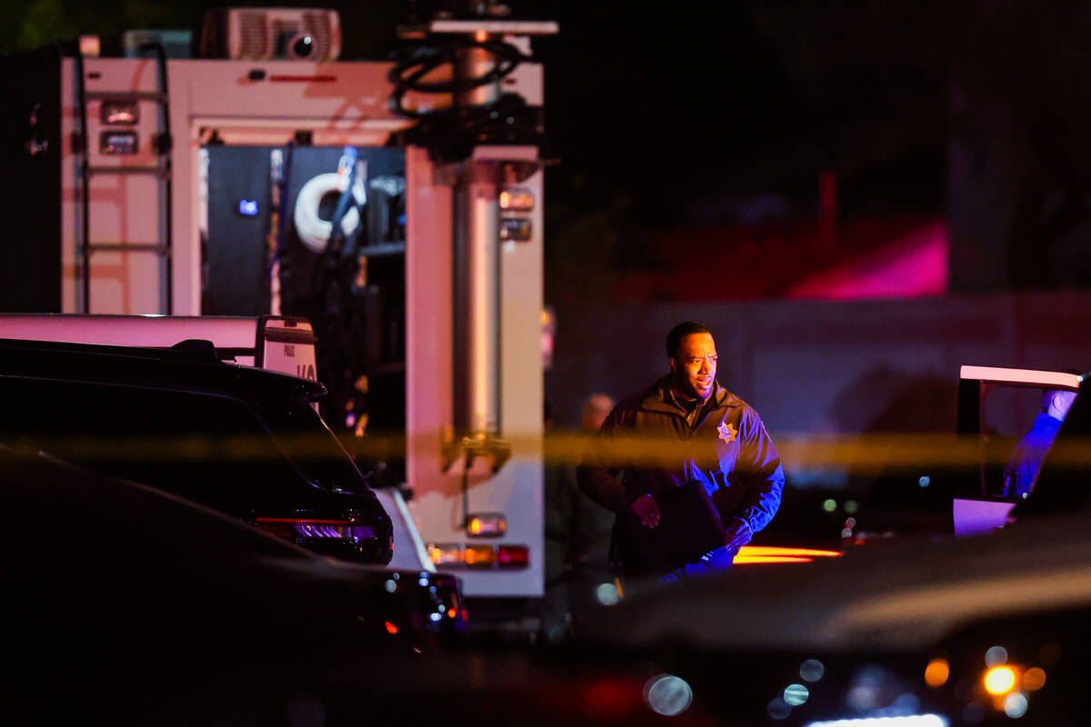 Metropolitan Police Department officers are seen on scene at an officer-involved shooting on So ...