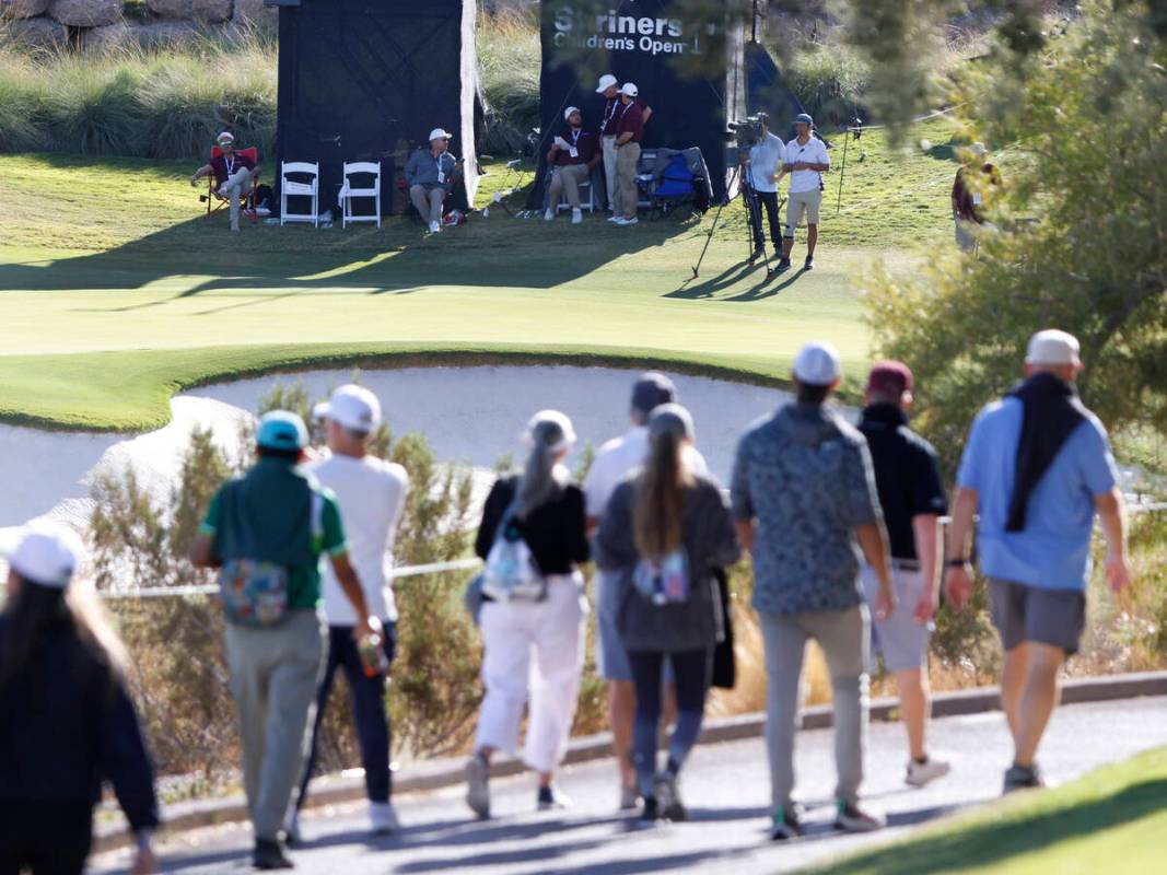 People follow players during the third day of the Shriners Children's Open at TPC Summerlin, on ...