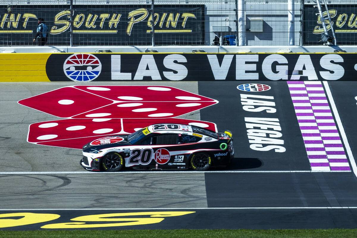 Christopher Bell (20) passes the start/finish line during the NASCAR Cup Series practice sessio ...