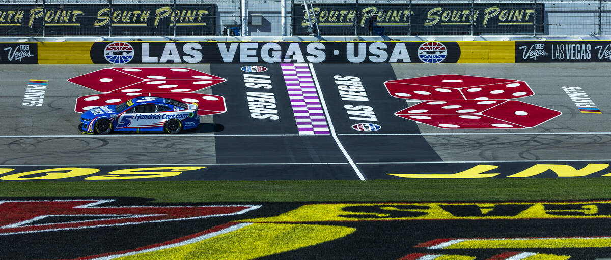 Kyle Larson (5) passes the start/finish line during the NASCAR Cup Series practice session for ...