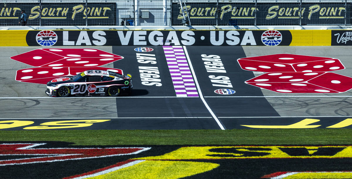 Christopher Bell (20) passes the start/finish line during the NASCAR Cup Series practice sessio ...