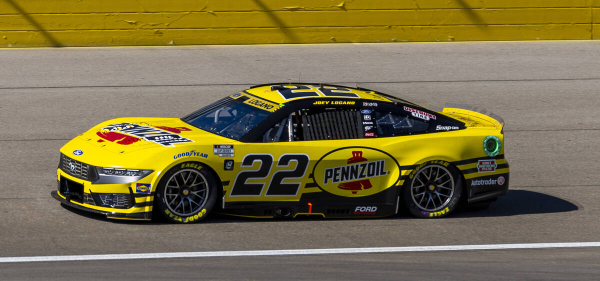 Joey Logano (22) makes his way around the track during the NASCAR Cup Series practice session f ...