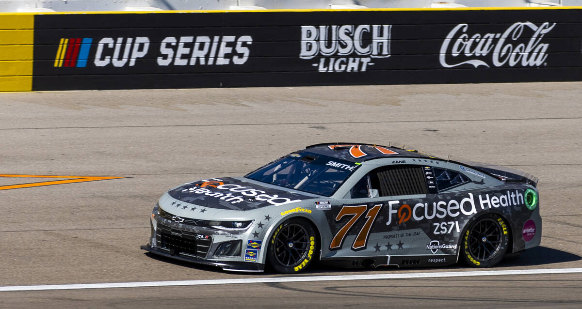 Zane Smith (71) makes his way around the track during the NASCAR Cup Series practice session fo ...