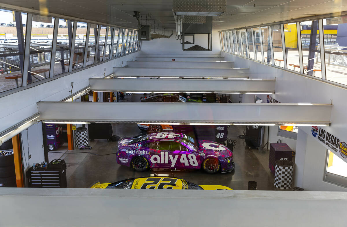 Alex Bowman's car sits in the Neon Garage with others before NASCAR Cup Series practice and qua ...