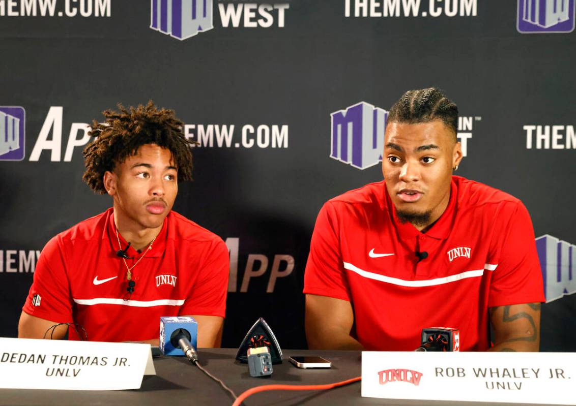 UNLV Rebels forward Rob Whaley Jr. speaks as guard Dedan Thomas Jr., left, looks on during the ...