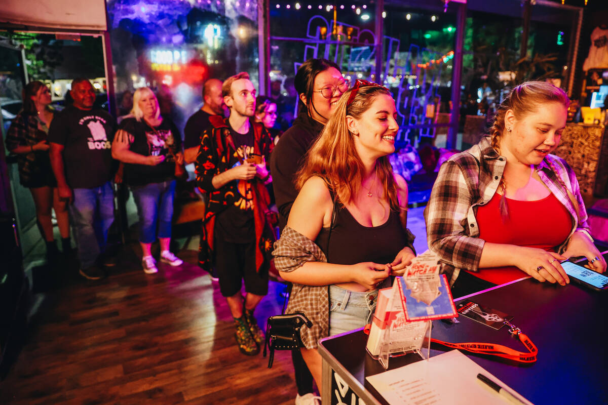 Jordan Smith, left, and Mackenzie Gabany check in at the front desk for a performance of &#x201 ...