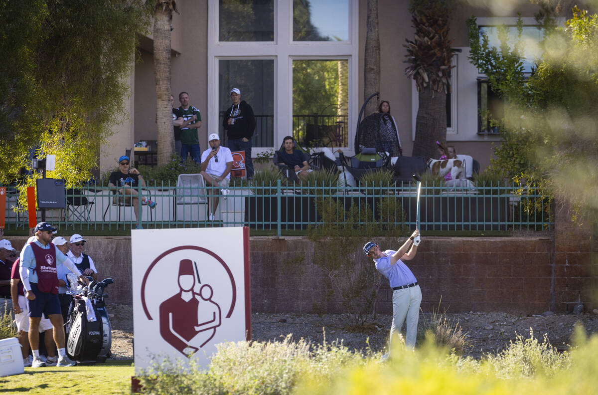 J.T. Poston tees off from the 11th hole during the final round of the Shriners Children’ ...