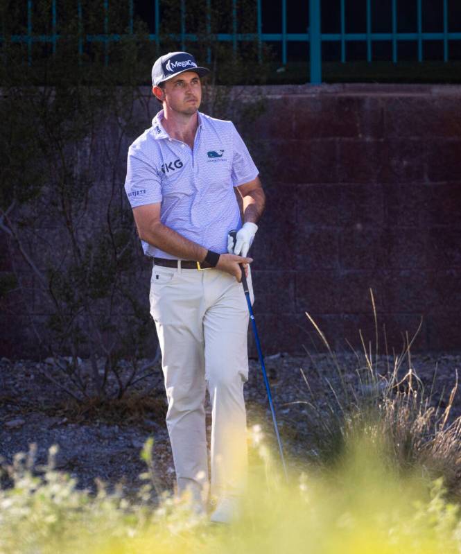 J.T. Poston watches his tee shot from the 11th hole during the final round of the Shriners Chil ...