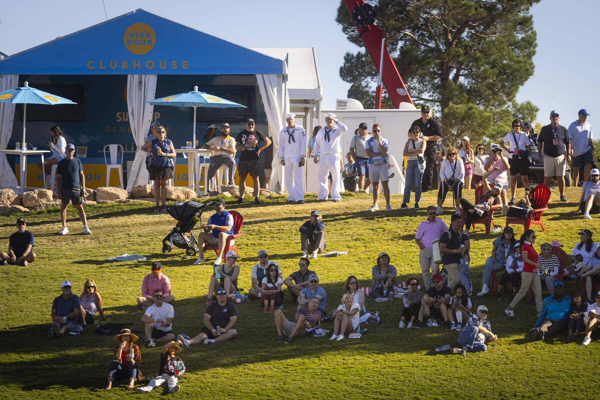 Golf fans watch the action at the 18th hole during the final round of the Shriners Children&#x2 ...