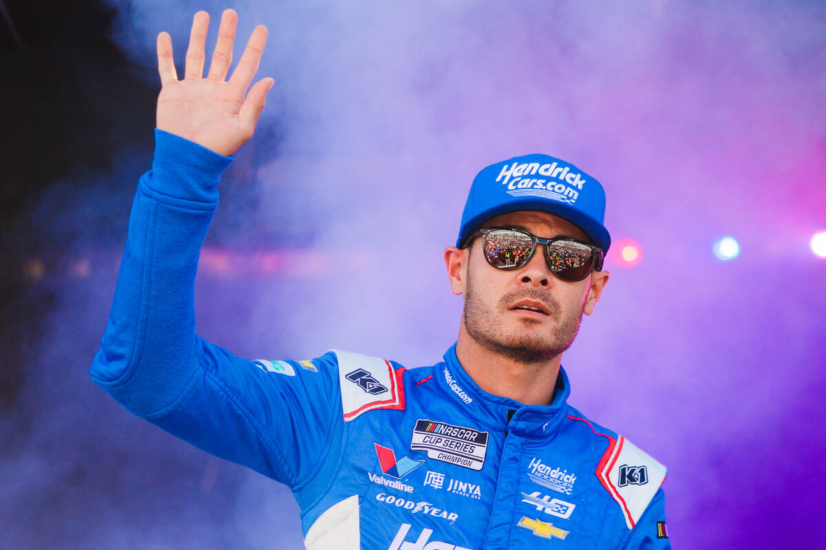 NASCAR driver Kyle Larson waves to fans during the South Point 400 NASCAR Cup Series race at th ...