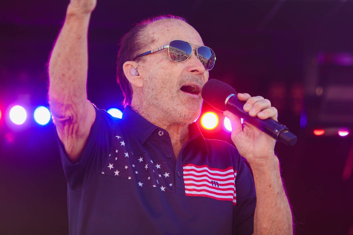 Lee Greenwood performs during the South Point 400 NASCAR Cup Series race at the Las Vegas Motor ...