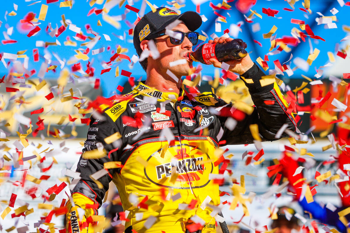 Joey Logano celebrates winning the South Point 400 NASCAR Cup Series race at the Las Vegas Moto ...