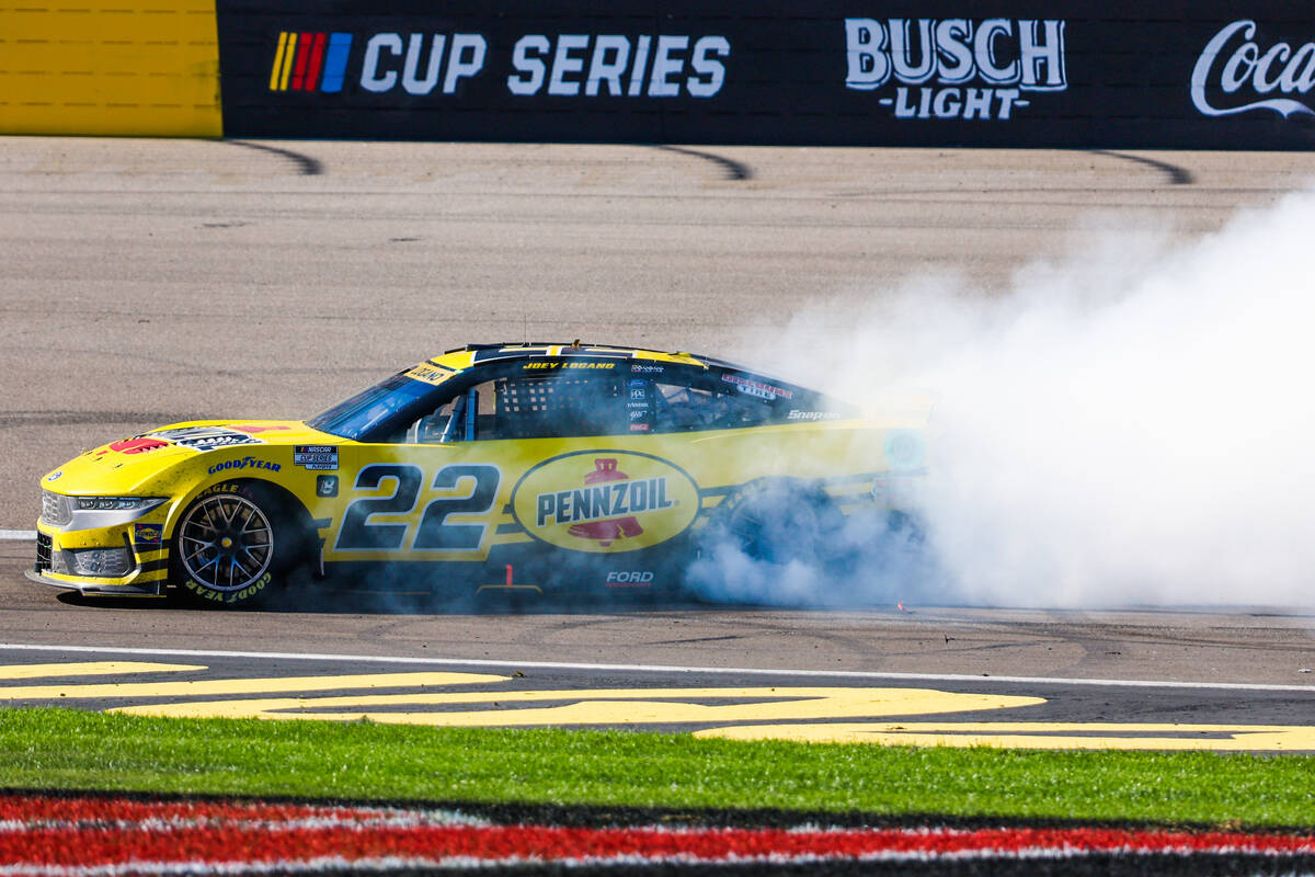 NASCAR driver Joey Logano celebrates winning the South Point 400 NASCAR Cup Series race at the ...