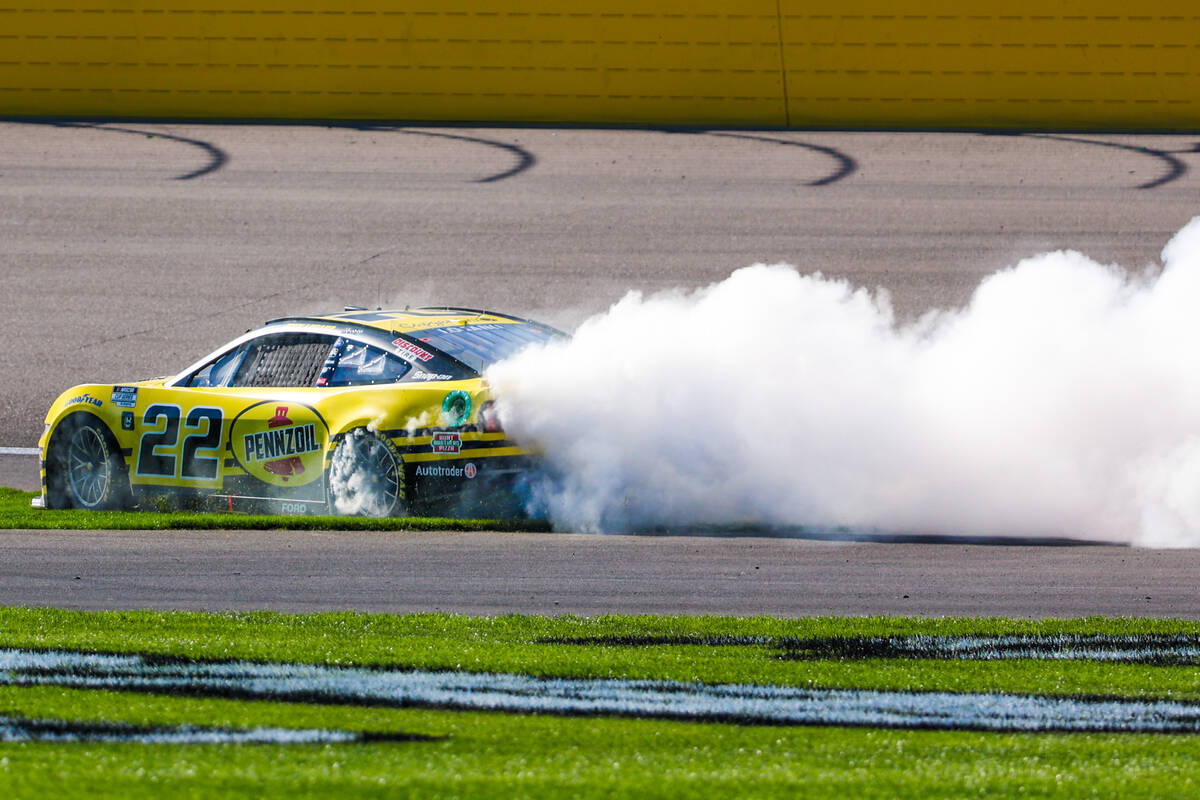 NASCAR driver Joey Logano celebrates winning the South Point 400 NASCAR Cup Series race at the ...