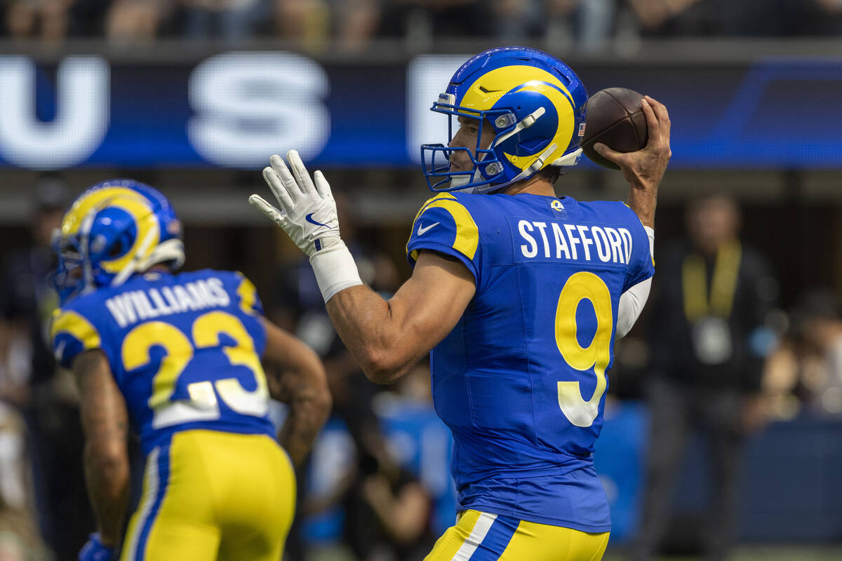 Los Angeles Rams quarterback Matthew Stafford (9) throws against the Raiders during the first h ...