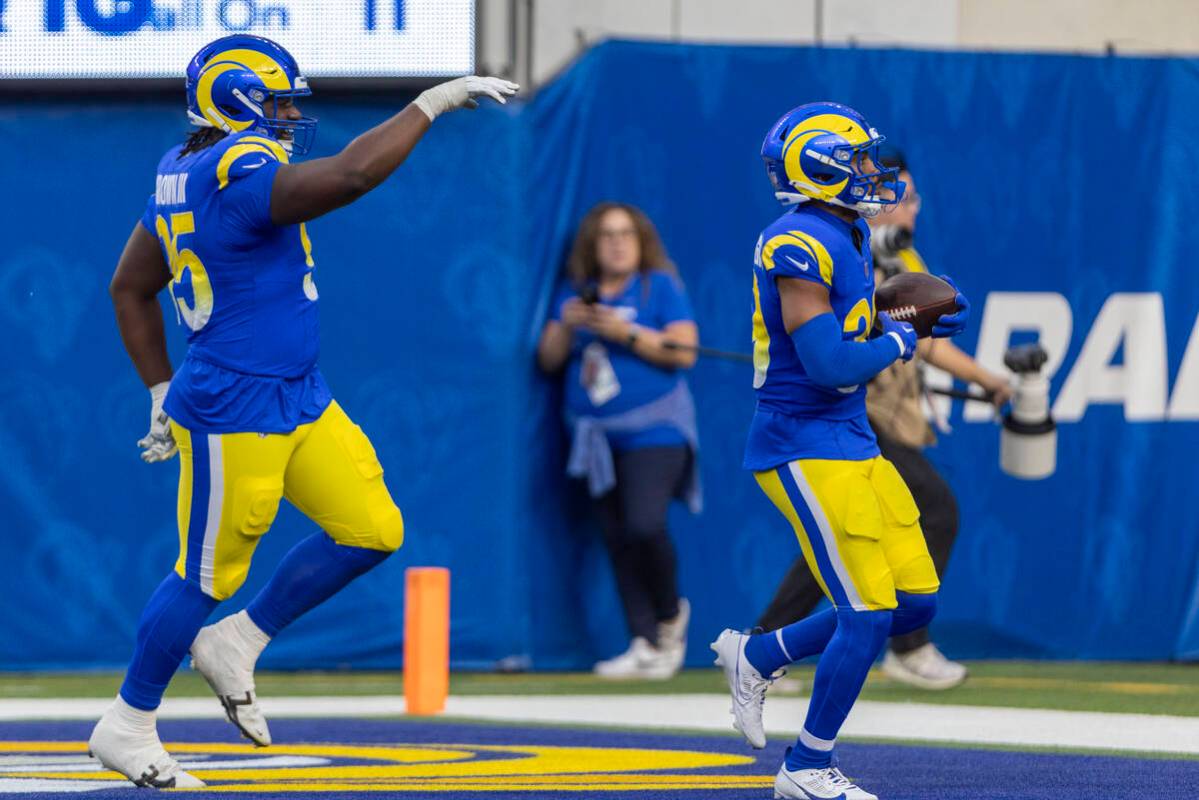 Los Angeles Rams safety Jaylen McCollough (39) celebrates his interception of Raiders quarterba ...