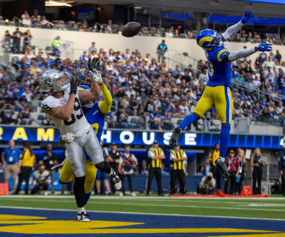 Los Angeles Rams safety Kamren Curl (3) leaps to try to break up a pass intended for Raiders ti ...