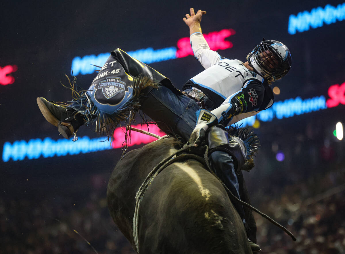 Carolina Cowboys’ Daylon Swearingen rides a bull at the Professional Bull Riders Teams C ...