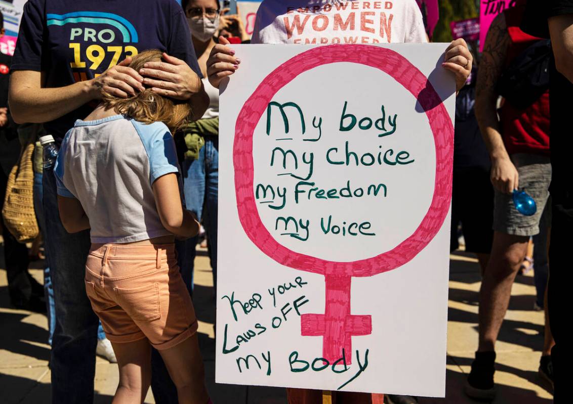 Demonstrators gather outside the Lloyd D George Courthouse during a March for Reproductive Righ ...