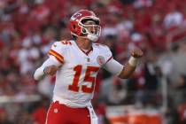 Kansas City Chiefs quarterback Patrick Mahomes (15) celebrates after a touchdown by Mecole Hard ...