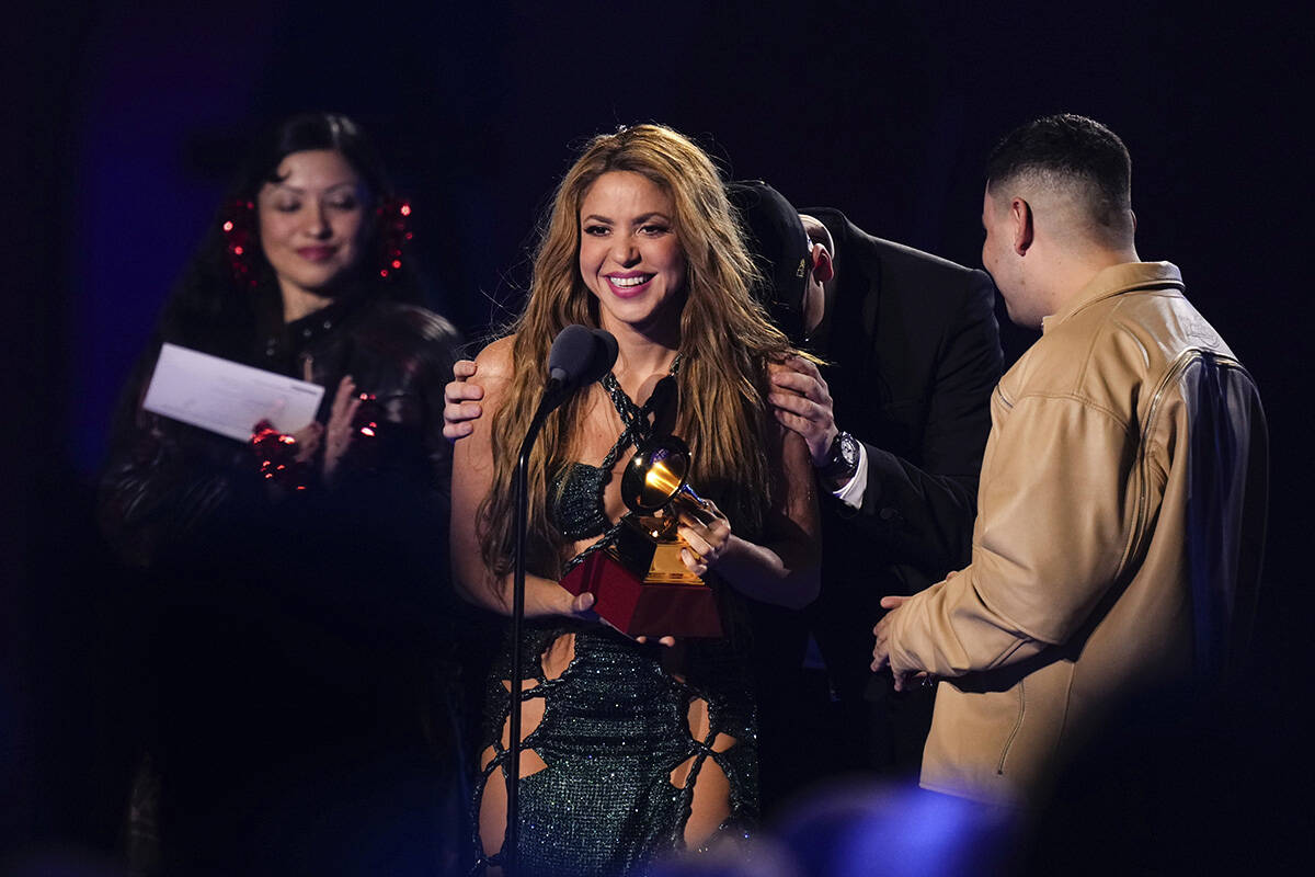 Shakira, from left, Bizarrap, and Kevyn Mauricio Cruz accept the award for song of the year for ...