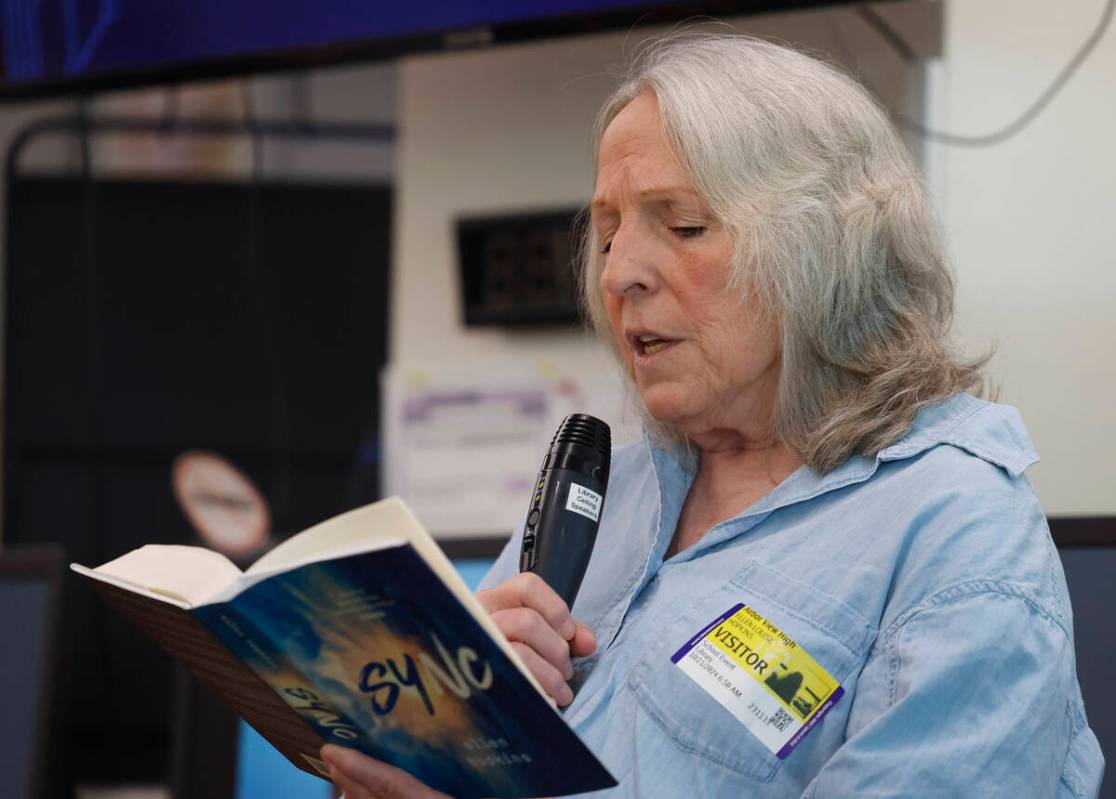 Ellen Hopkins, a banned author, reads from her book titled "Sync" at Arbor View High ...